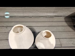 Planta redonda de fibra de arcilla vintage tallada a mano con acabado clásico vintage