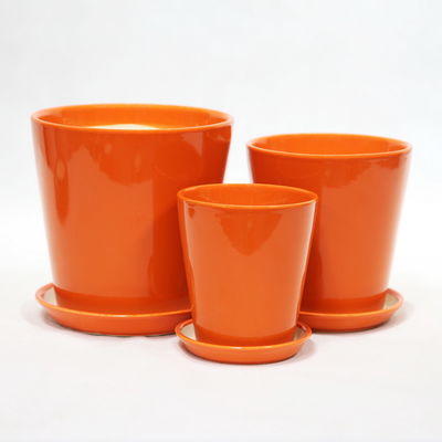 comprar Decoración de interiores Jarras de cerámica naranja hechas a mano con agujeros de drenaje online manufacture