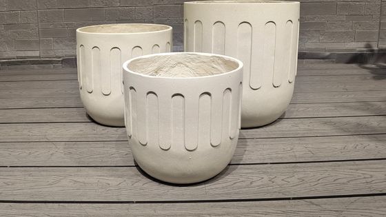 comprar Un sorprendente plantador moderno de arcilla de fibra con drenaje resistente a las heladas online manufacture