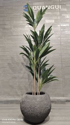 comprar Jardinera redonda de fibra de arcilla texturizada gris con patrón natural similar a la roca online manufacture