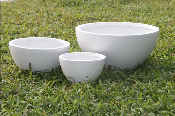 Modernas macetas de jardín redondas de fibra de arcilla talladas a mano