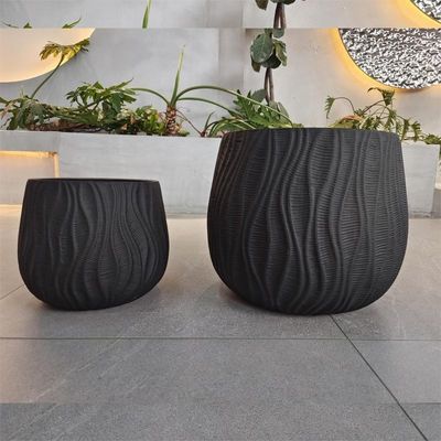 Plantación de tierra de fibra de arcilla moderna redonda y pesada tallada a mano para la decoración del jardín doméstico